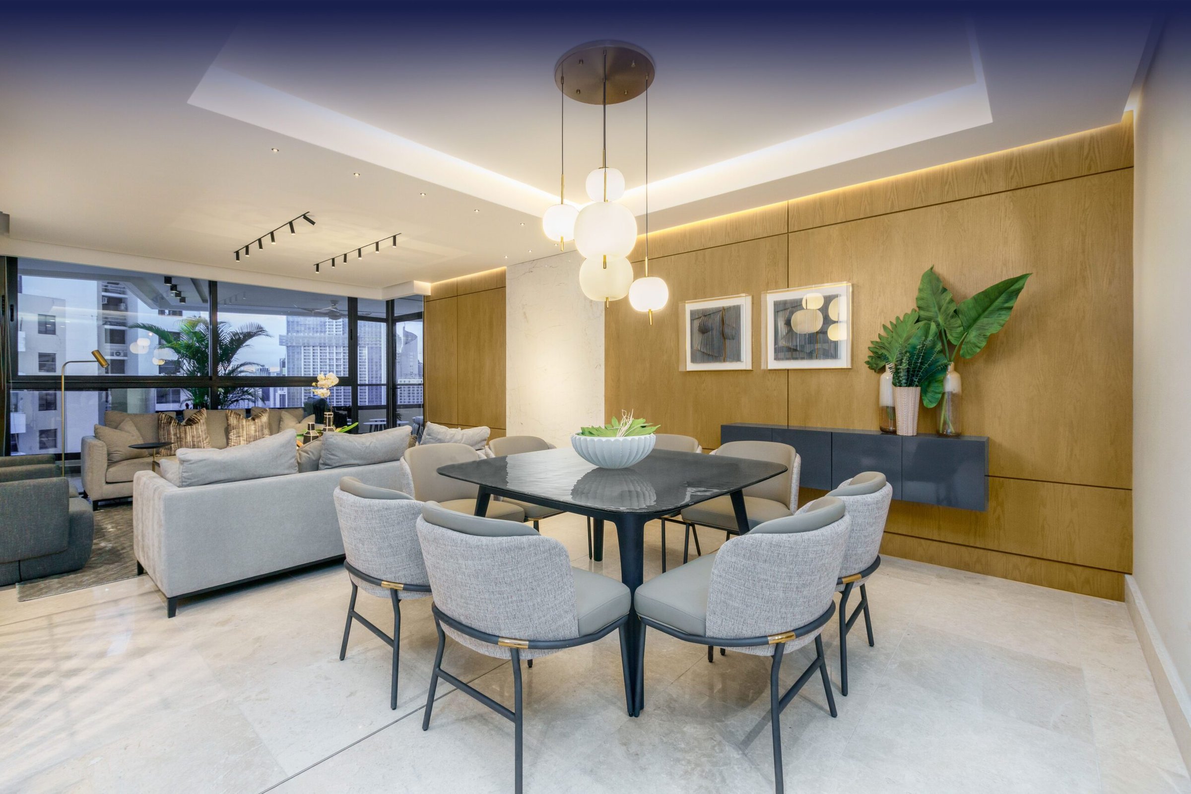 Deluxe Residences — interior photograph of a furnished apartment living and dining area